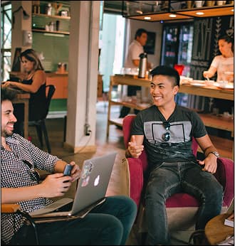 People working in a cafe